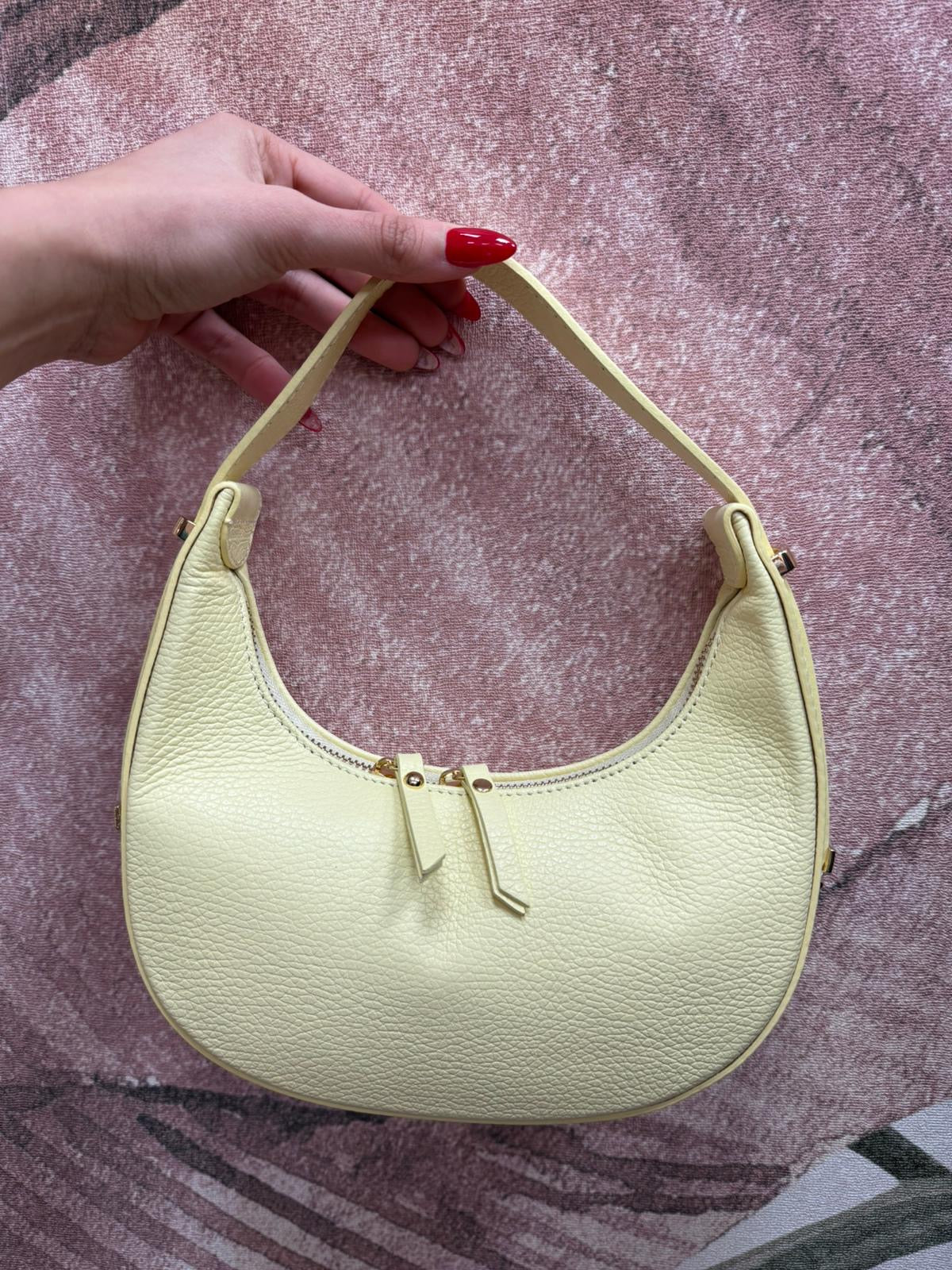 Mezzaluna in vera pelle