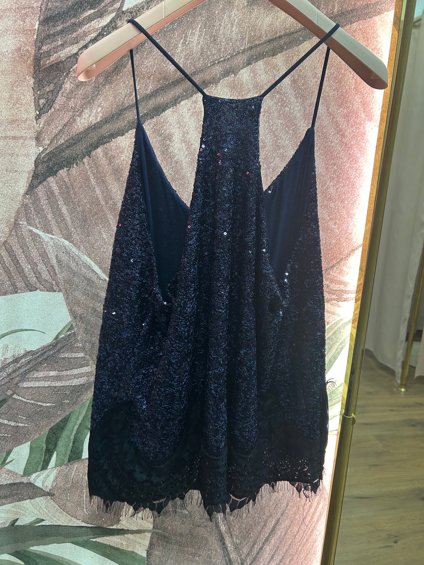 Top Paillettes con dettaglio pizzo